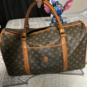 Canvas with leather trim travel bag